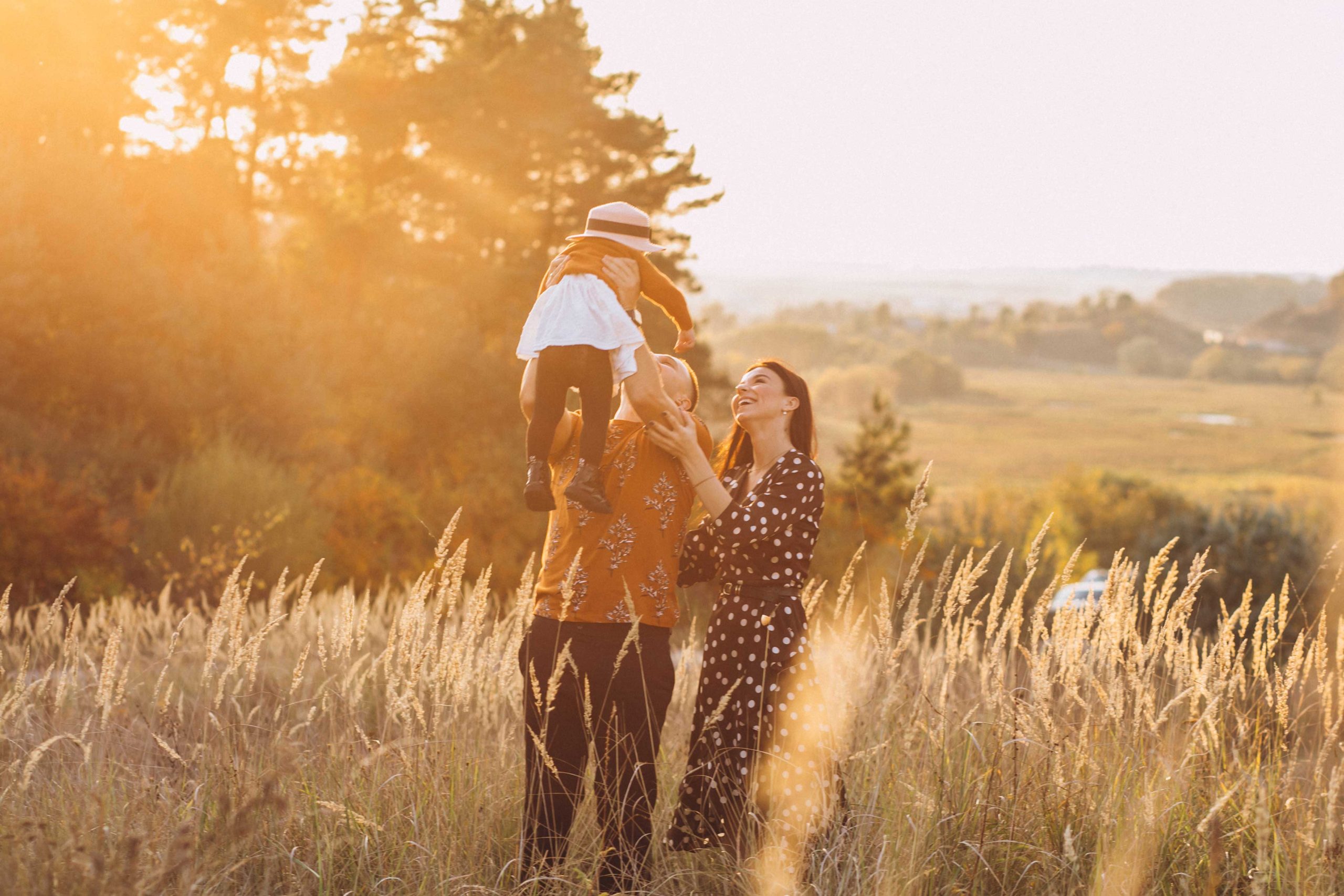 family-with-their-little-daughter-autumn-field-WEB